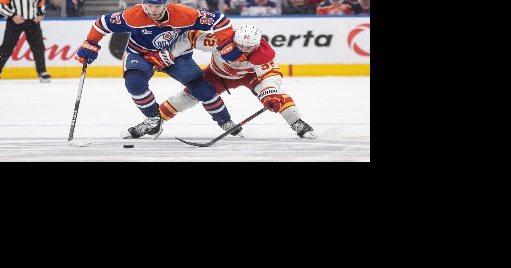 Flames rally for victory over Oilers, continue streak of season-opening wins