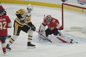 Penguins place Malkin on IR; Bunting in car accident