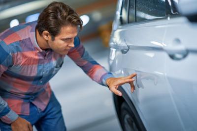 scratched car.jpg