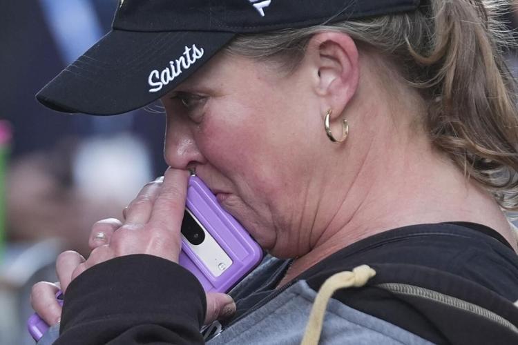 New Orleans mourns truck attack victims with tearful vigil