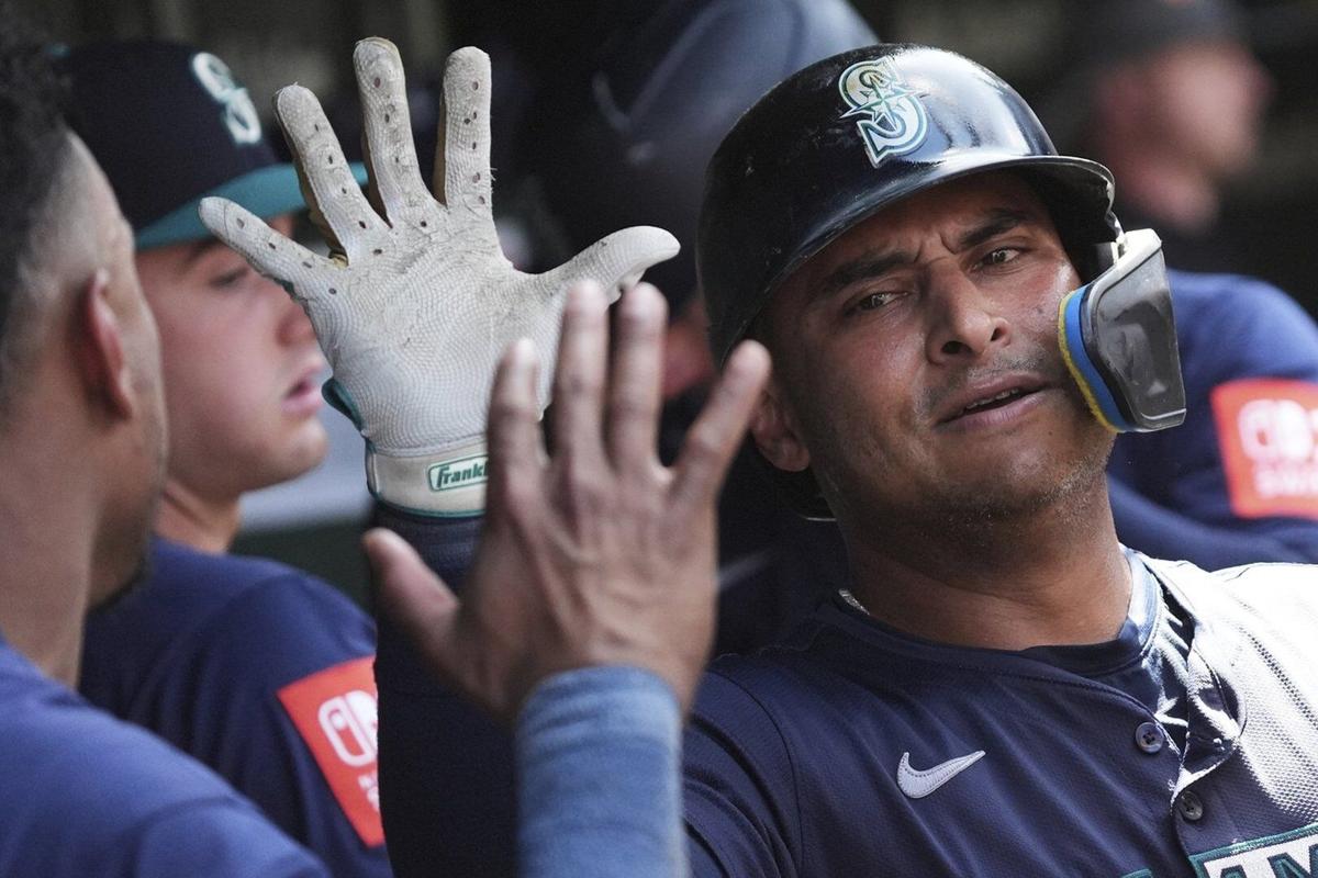 Donovan Solano hits 2 homers as the Seattle Mariners beat the Chicago Cubs  14-6