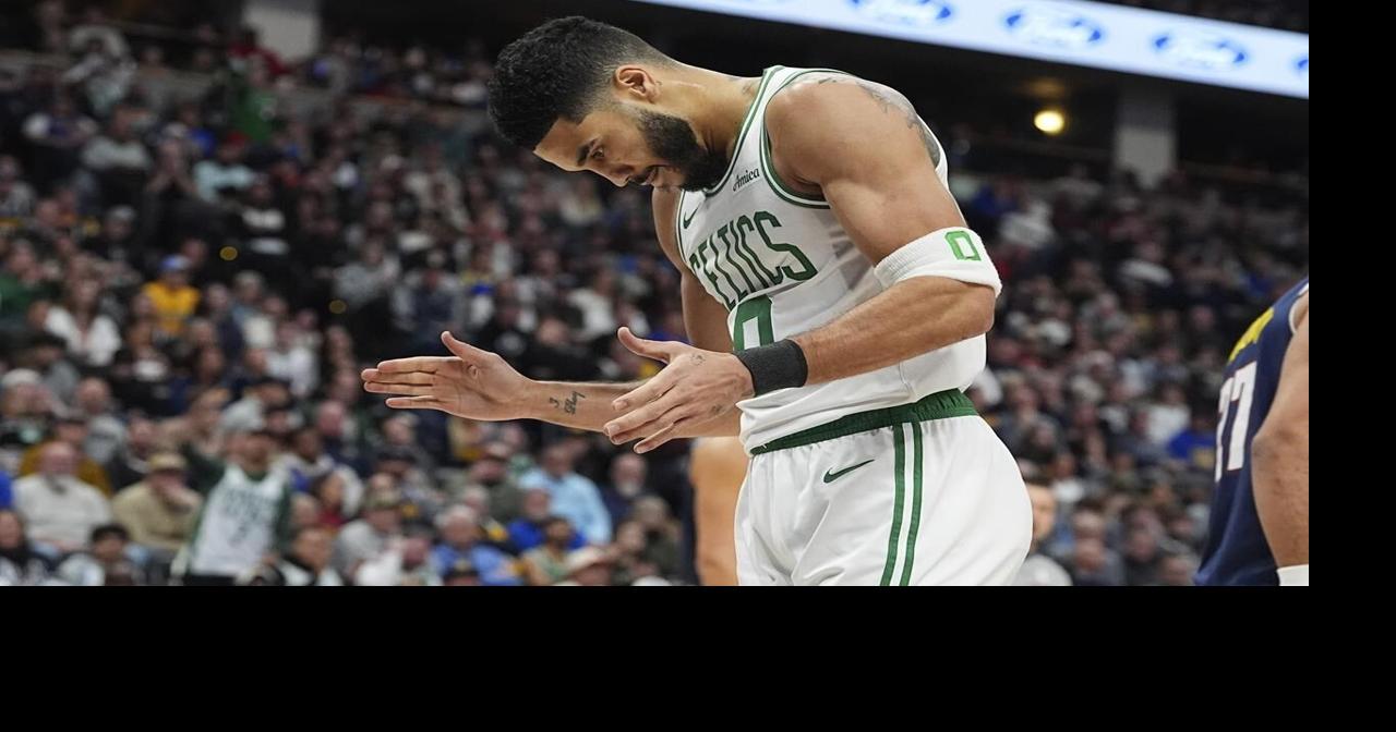 Jayson Tatum scores 29, Porzingis adds 25 as Celtics hold off depleted Nuggets 118-106