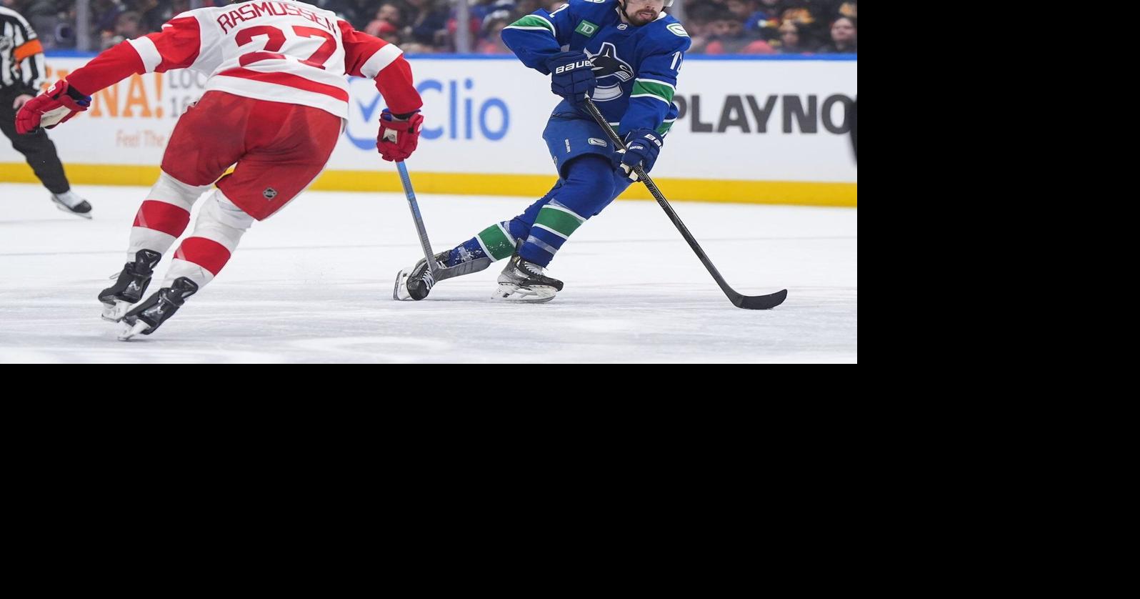 DeBrincat scores in OT, Detroit Red Wings edge Vancouver Canucks 3-2