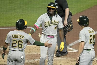 Butler and Kurtz homer to lead the Athletics past the Pirates, 4-3