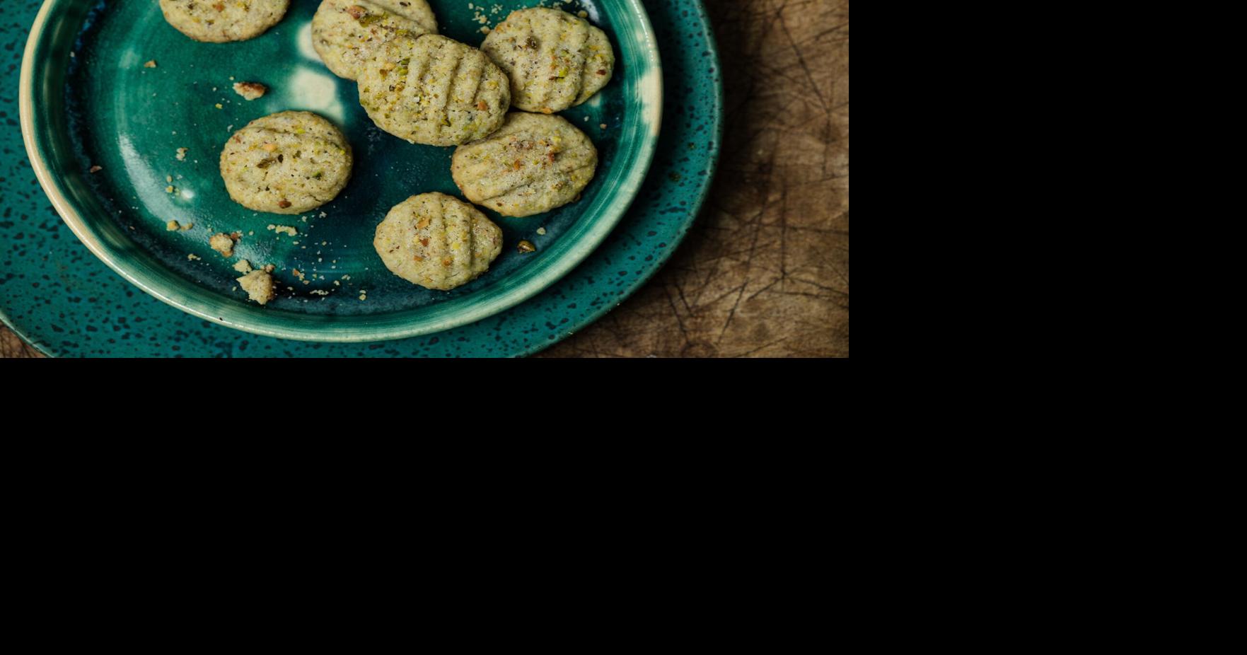 Cardamom and pistachio jazz up basic sugar cookies in this easy recipe