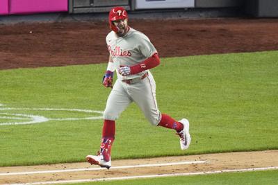 Schwarber's 1,000th hit is 319th homer, topping McGwire for most to the mark