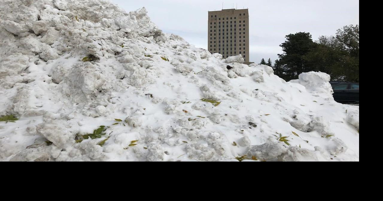 The Latest Storm dumps foot of snow in North Dakota