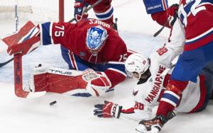Wilson's big hit sparks Capitals in 5-2 win, pushes Canadiens to brink of elimination