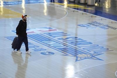 Basketball 'court' at Indianapolis airport to promote NBA All-Star Game is turning heads