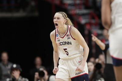 Bueckers has career-high 40 to lead one-woman March Madness rout for UConn,  82-59 over Oklahoma