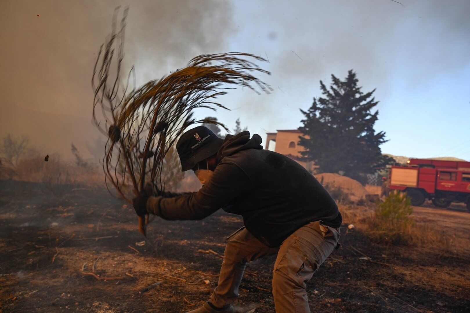 Two dead after firefighting helicopters collide in Greece; water-dropping aircraft take off to tackle the major Greek wildfire