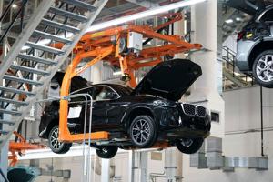 FACT FOCUS: Trump says tariffs have brought more US auto factories. His numbers are off.
