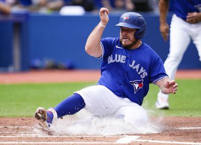 Robbie Ray strikes out 14 as Blue Jays score 2 in the 8th to