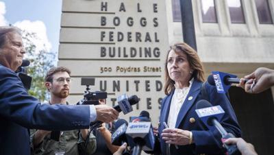 A New Orleans sheriff's office staffer has been arrested following the escape of 10 jail inmates
