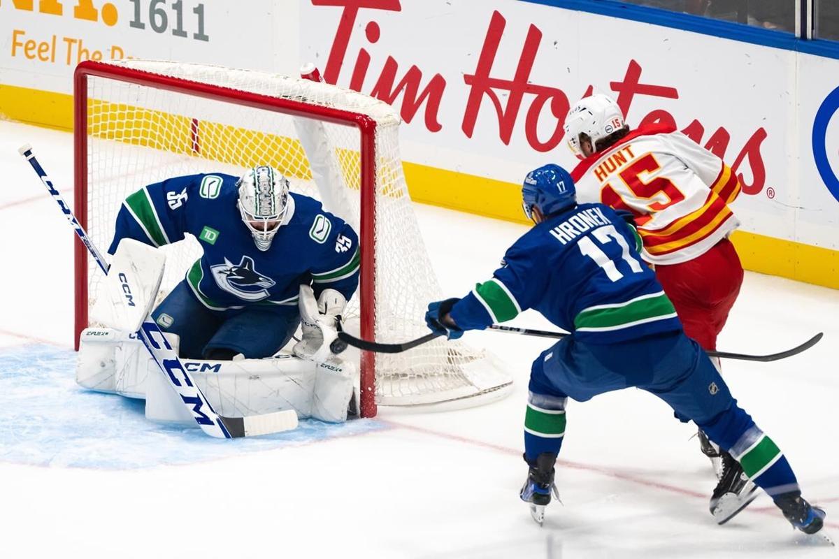 Canucks will resume season Friday with 19 games in 31 days
