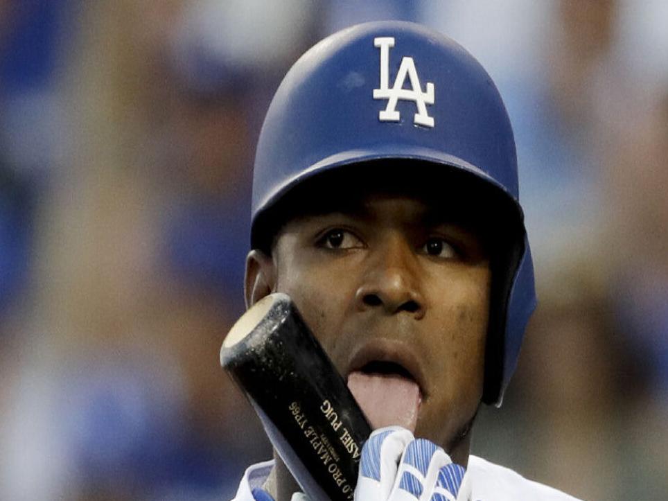Dodgers' Yasiel Puig launches himself tongue-first into October baseball