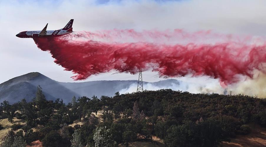 Wildfires plague the West amid a scorching heat wave and high winds