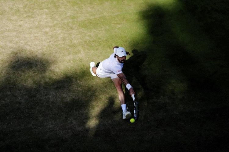 A tip of the cap to the Wimbledon player who caught his hat when it fell off but still won a point