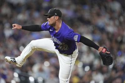 Braves acquire reliever Tyler Kinley from Rockies for minor league pitcher Austin Smith