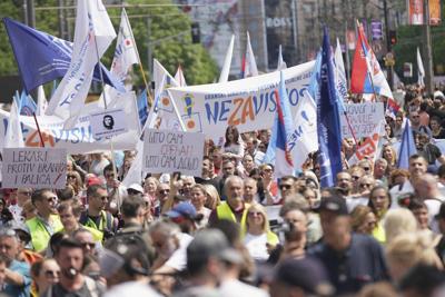 A Serbian court swaps prison for house arrest for 3 out of 6 jailed activists after pressure