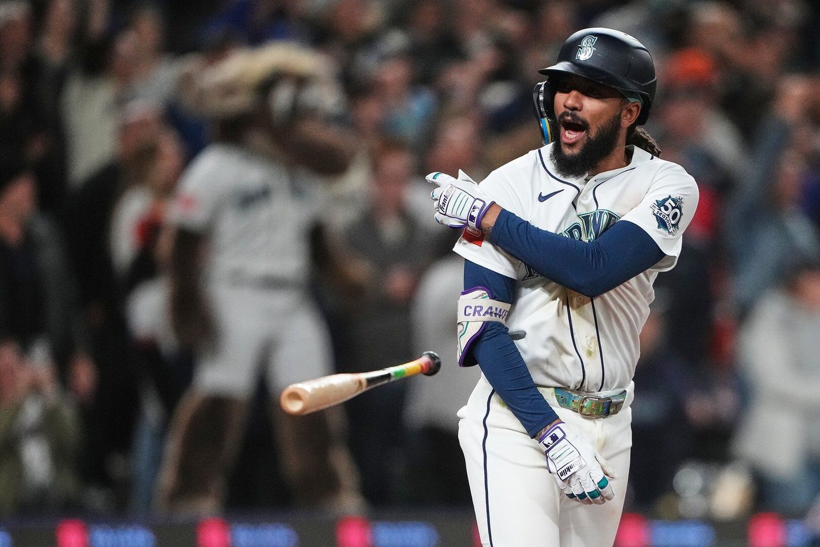 Crawford caps Mariners rally with RBI single in 9th to beat reeling ...
