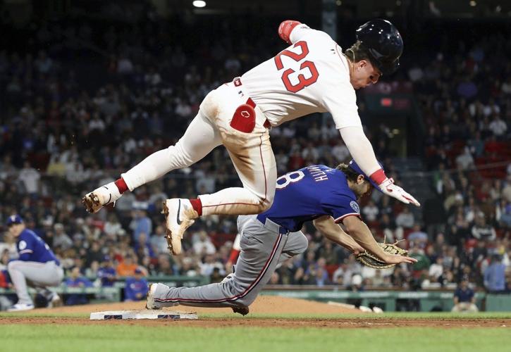 Red Sox 1B Romy Gonzalez leaves game after collision at first, running out grounder