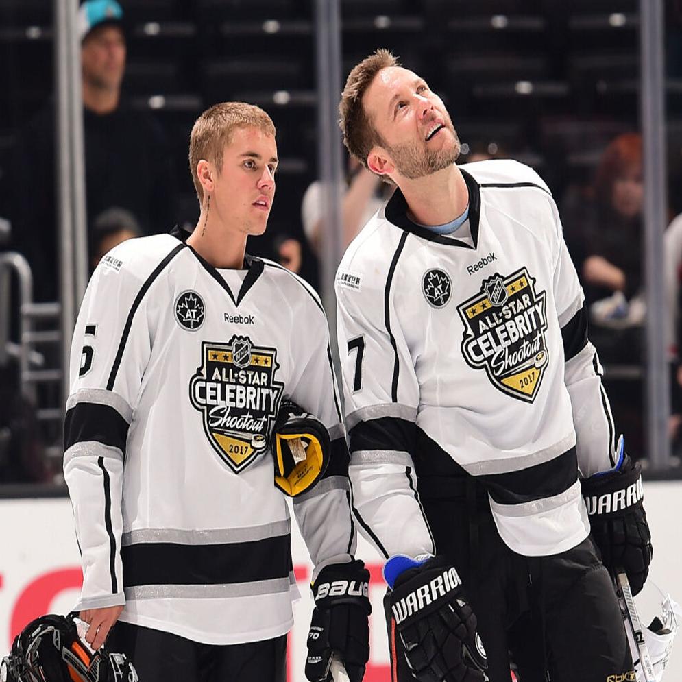 Justin Bieber gets hit, but shows skills in celeb hockey game