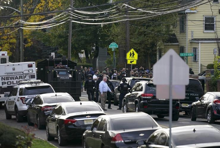 2 police officers shot in Newark; suspect at large