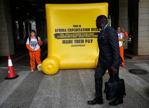 Environmentalists picket African Energy Week, urging an end to new oil and gas exploration