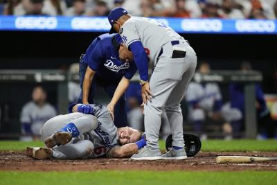 Dodgers' Rushing to have CT scan Saturday after suffering knee inury Friday in loss to Orioles
