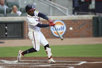 Braves second baseman Ozzie Albies leaves game vs. Nationals with apparent hand or wrist injury