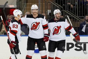 Jesper Bratt has goal and 3 assists, Jack Hughes scores 2 as Devils beat reeling Rangers 5-1