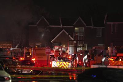 A medical plane carrying a child patient and 5 others crashes in Philadelphia, setting homes ablaze