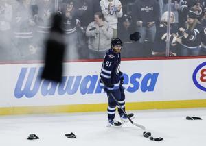 As Toews debuts with Jets, Connor shines in season-opening loss to Stars