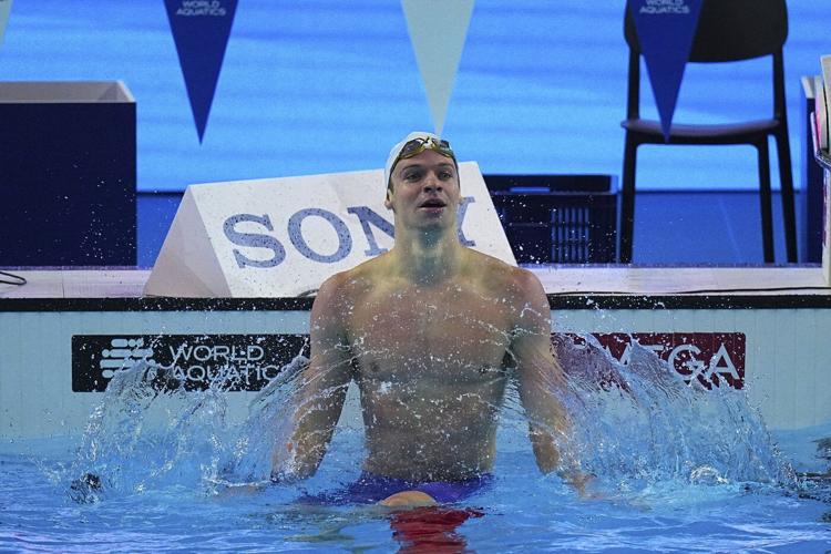 Léon Marchand breaks world record in 200 individual medley in 1 minute, 52.61 seconds
