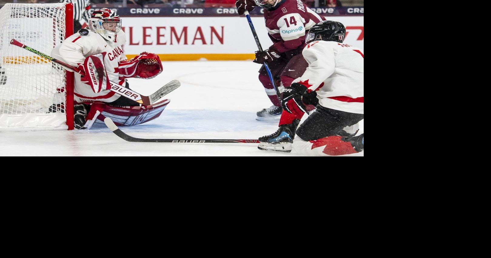 Hage scores in OT, Canada squeaks by Latvia 2-1 at world junior hockey championship