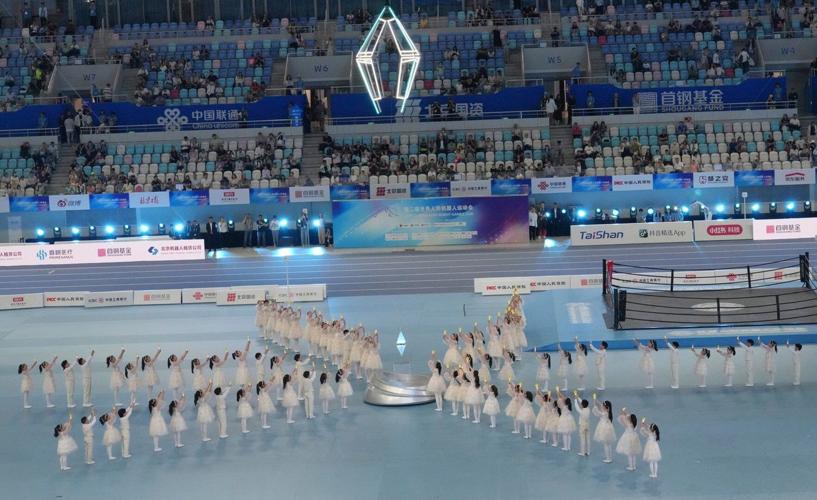 A robot sprinter shatters a 100-meter record again as sparks fly at ...