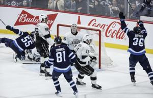 With captain Lowry out, Scheifele showing leadership for Jets