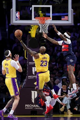With Luka Doncic suspended, LeBron James' triple-double powers Lakers ...