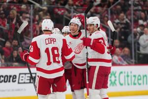 Gibson and Talbot combine to make 31 saves in the Red Wings' 3-0 win over the Devils