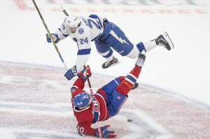 Hagel scores twice, Lightning rally to beat Canadiens 3-2 and even series