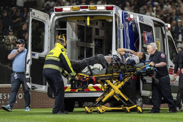 Grisham hits 2 homers to lead Yankees past Mariners 11-5, New York's Cabrera leaves in ambulance