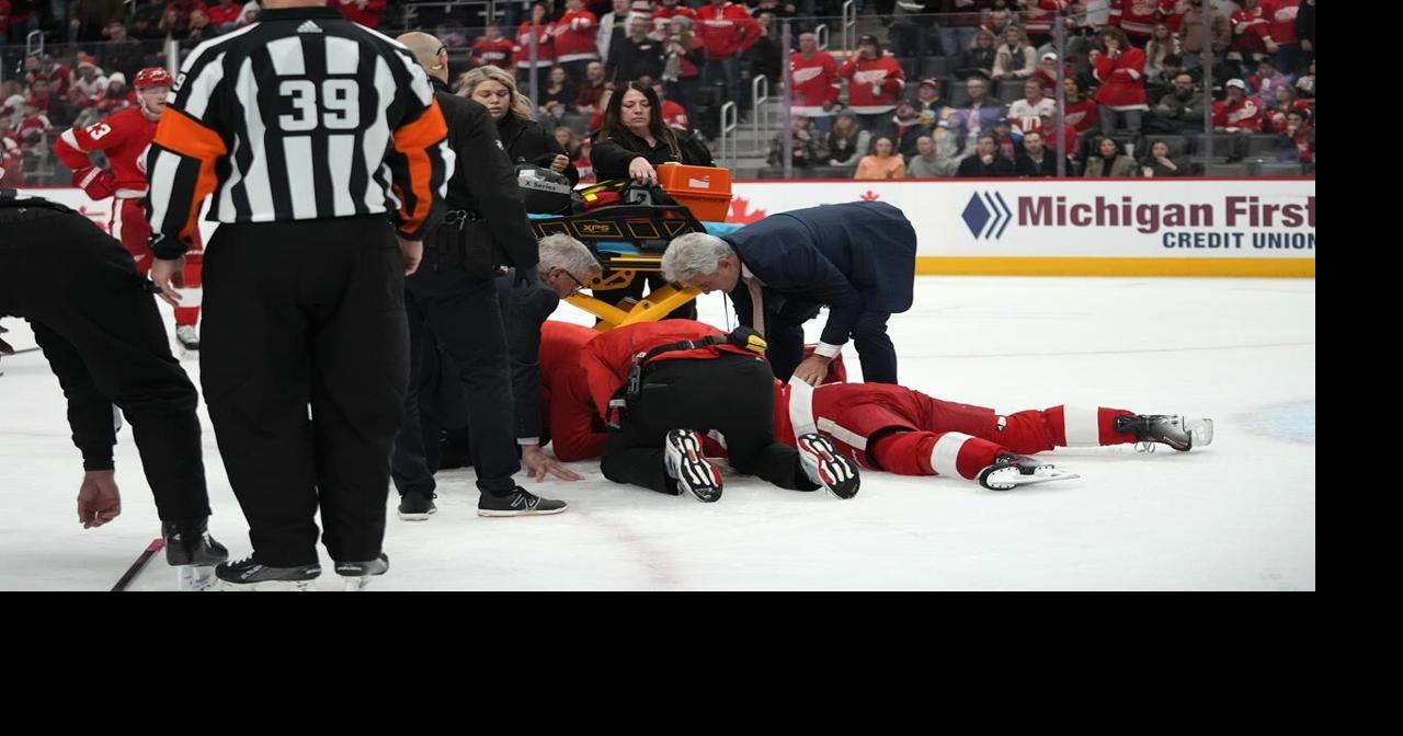 Red Wings' Larkin face-down, motionless on ice for about a minute after ...