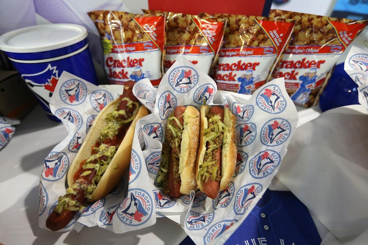 Two Blue Jays fans, 40 hot dogs, and a loonie dog doubleheader