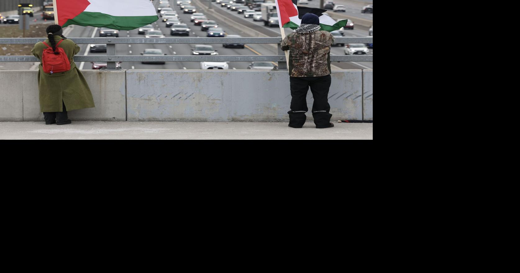 Police arrest 3 protesters on Avenue Road highway overpass