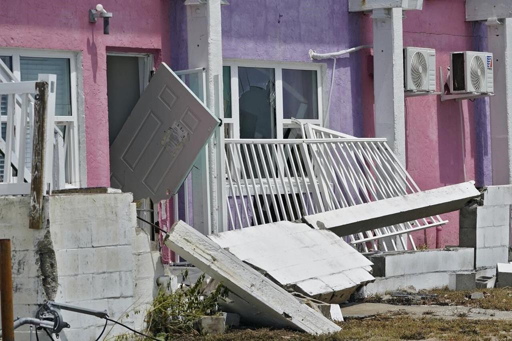 Residents pick through the rubble of lost homes and scattered belongings in  Hurricane Idalia's wake