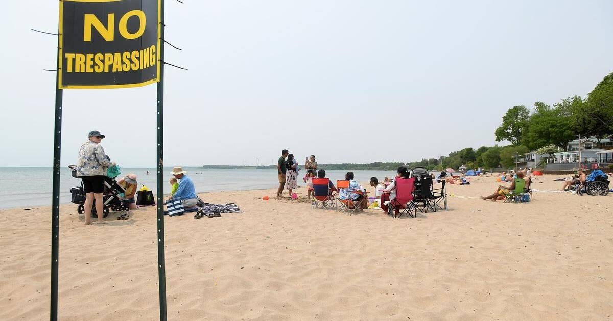 ‘No trespassing’ signs ignored by some Port Dover beach visitors as public access dust-up continues ‘No trespassing’ signs ignored by some Port Dover beach visitors as public access dust-up continues