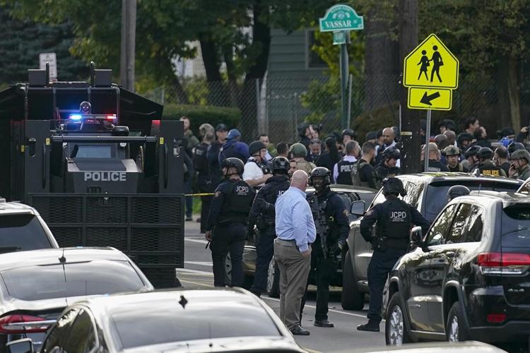 2 police officers shot in Newark; suspect at large