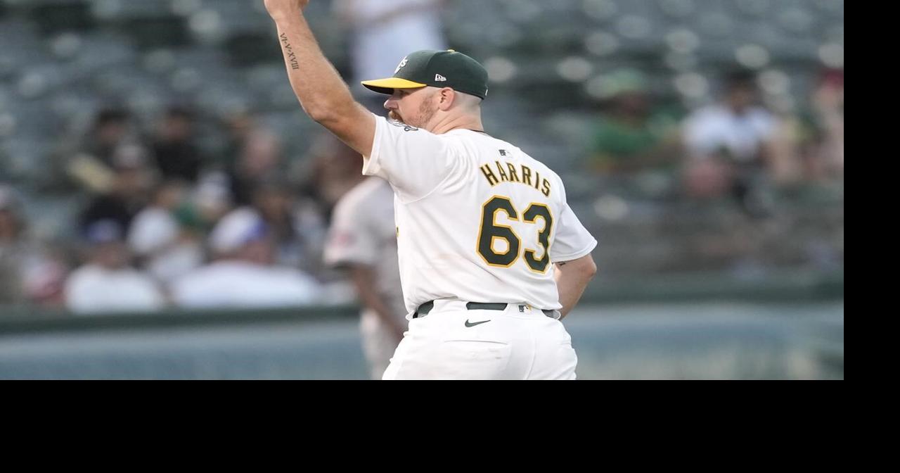 Hogan Harris and 3 Athletics relievers combine to blank Astros 4-0
