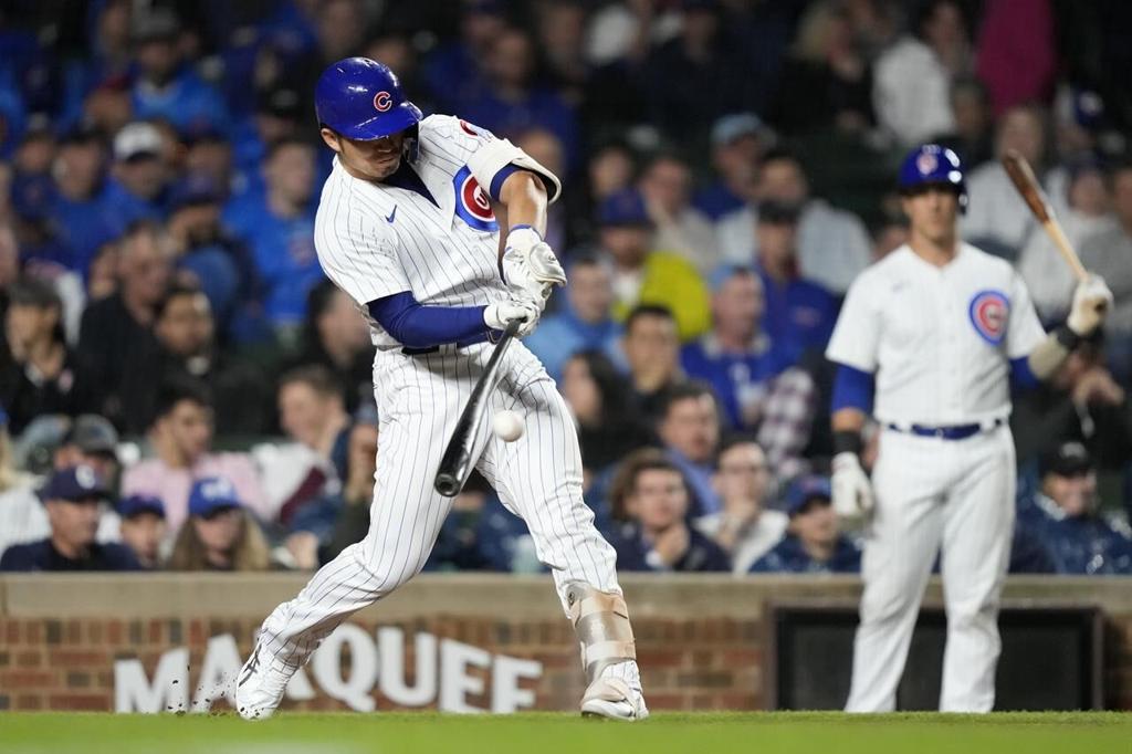 Canario's grand slam helps Cubs rout Pirates 14-1 to open half-game lead  for last wild card